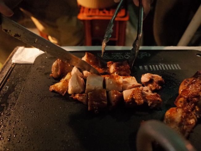 Rasta cutting chicken